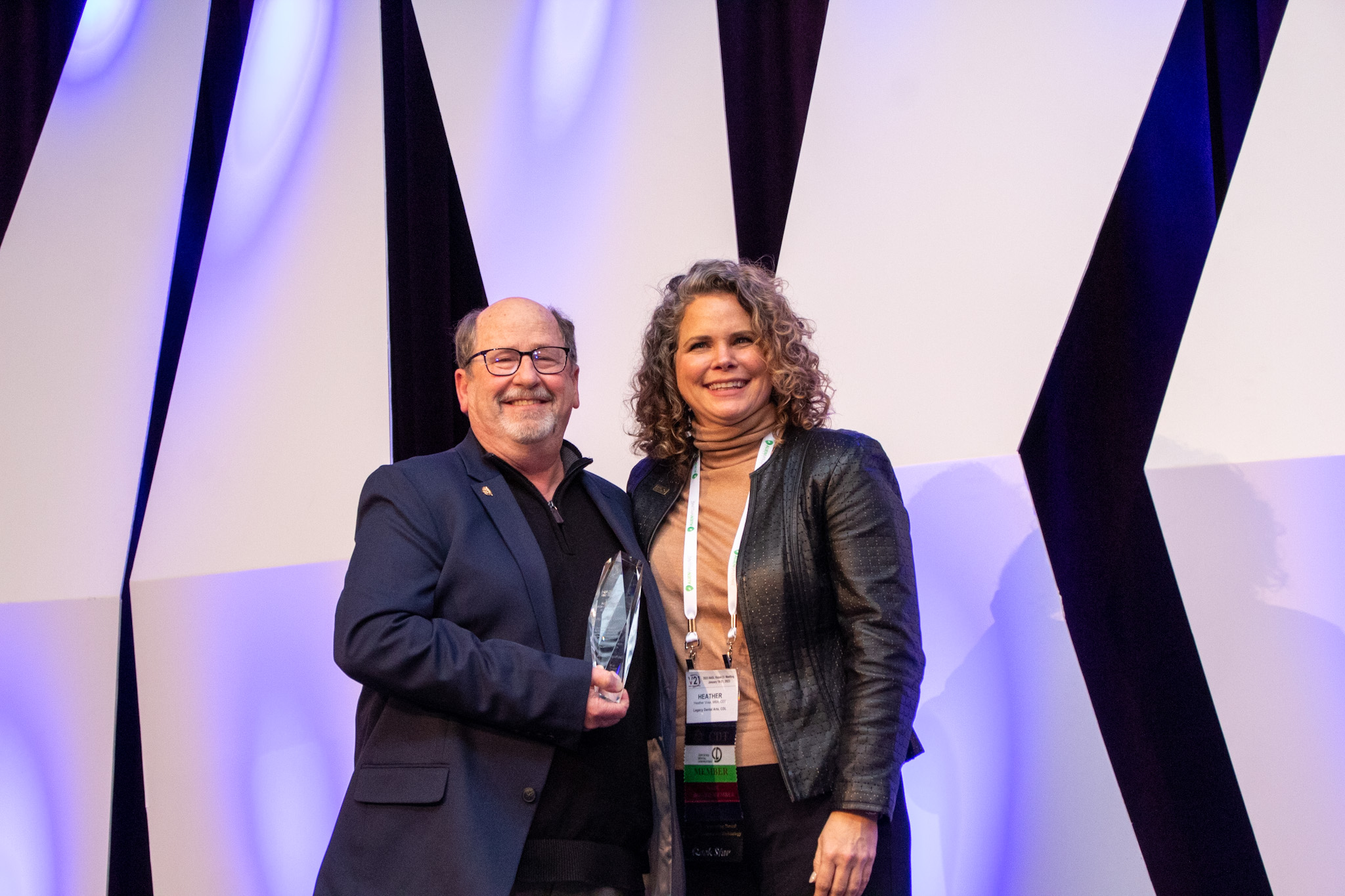 Gary Morgan receives merit award from Heather Voss NADL President